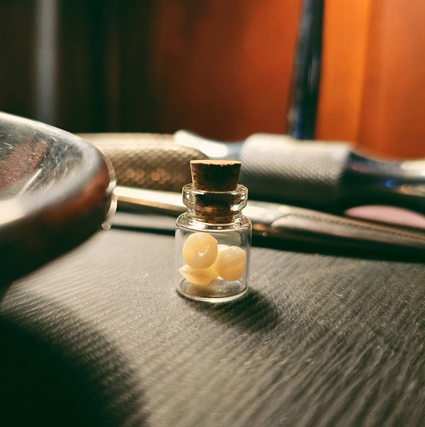 Small Vial of Teeth