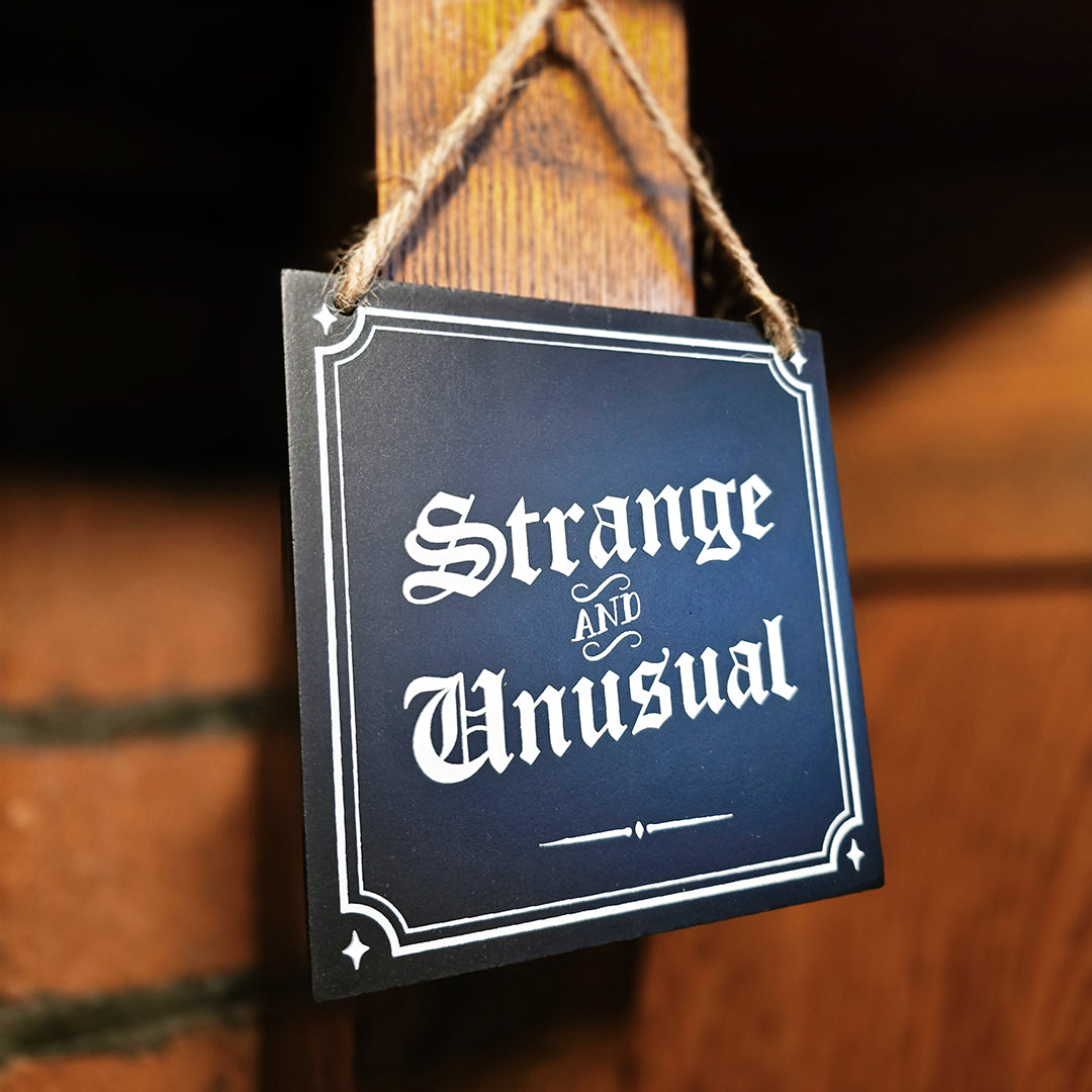 Strange and Unusual Hanging MDF Sign